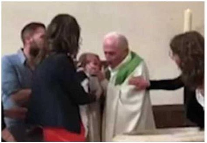 Angry priest slaps baby who wouldn’t stop crying during baptism